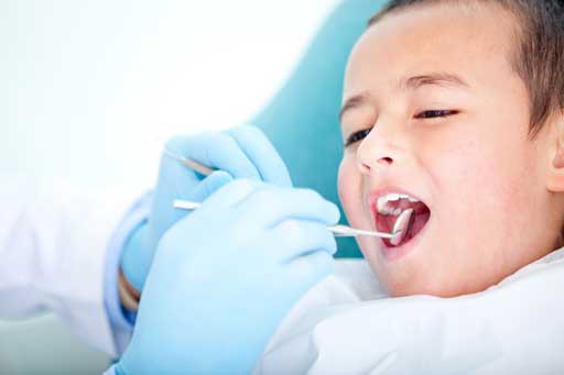 Small boy at the dentist